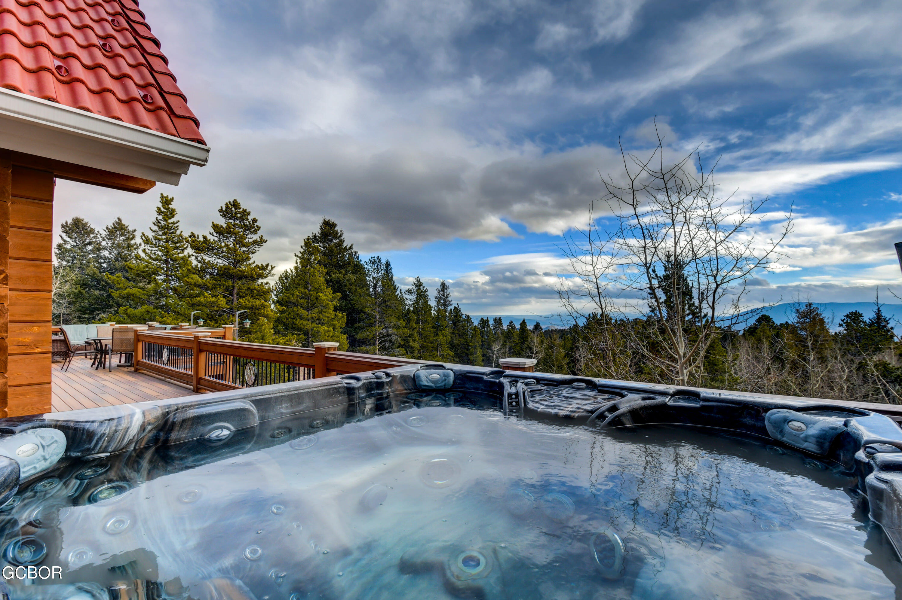 11006 Timothys Drive Conifer, CO 80433 - Photo 7 of 45 an outdoor view with patio