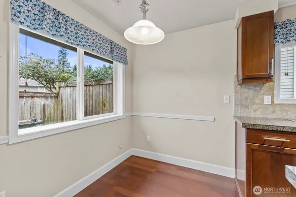 a view of a room with a large window