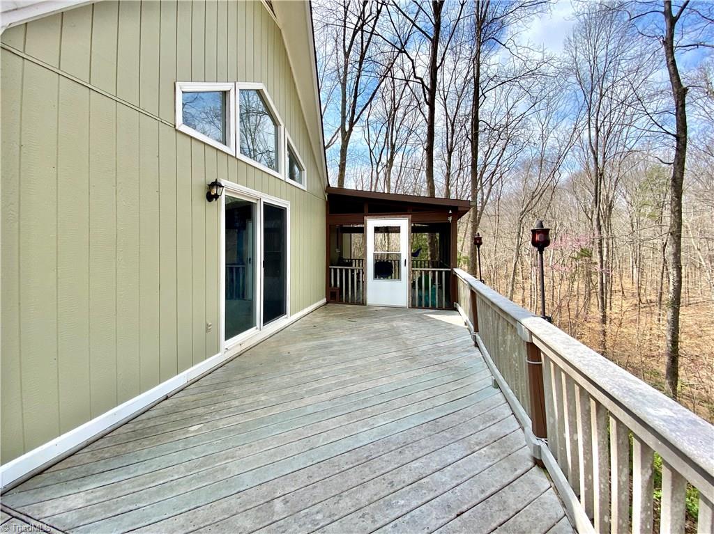 8318 Mccrory Road Stokesdale, NC 27357 - Photo 23 of 30 Additional view of deck and screened porch