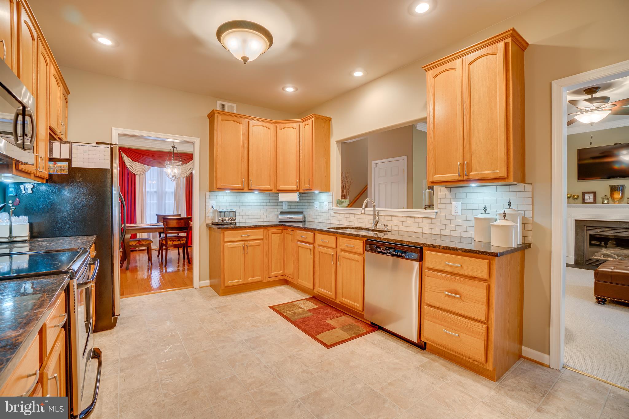 11529 Pine Hill Road King George, VA 22485 - Photo 20 of 63 Large galley kitchen to dining room