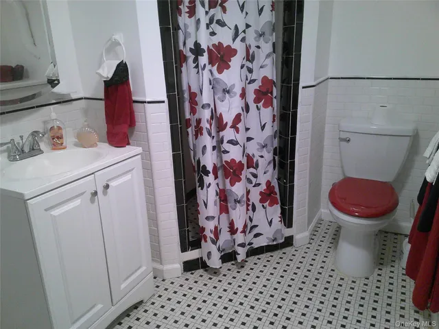 a bathroom with a sink and toilet