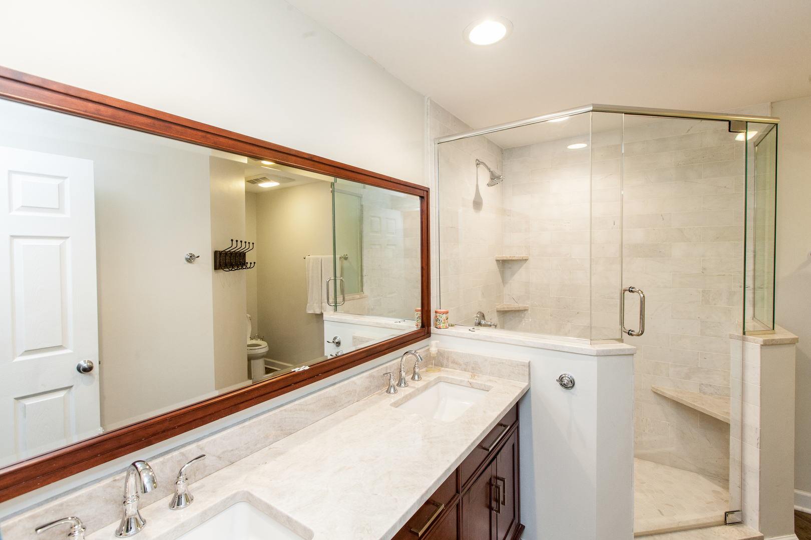 1 Juniper Road Rolling Meadows, IL 60008 - Photo 23 of 29 a bathroom with a granite countertop sink mirror and a