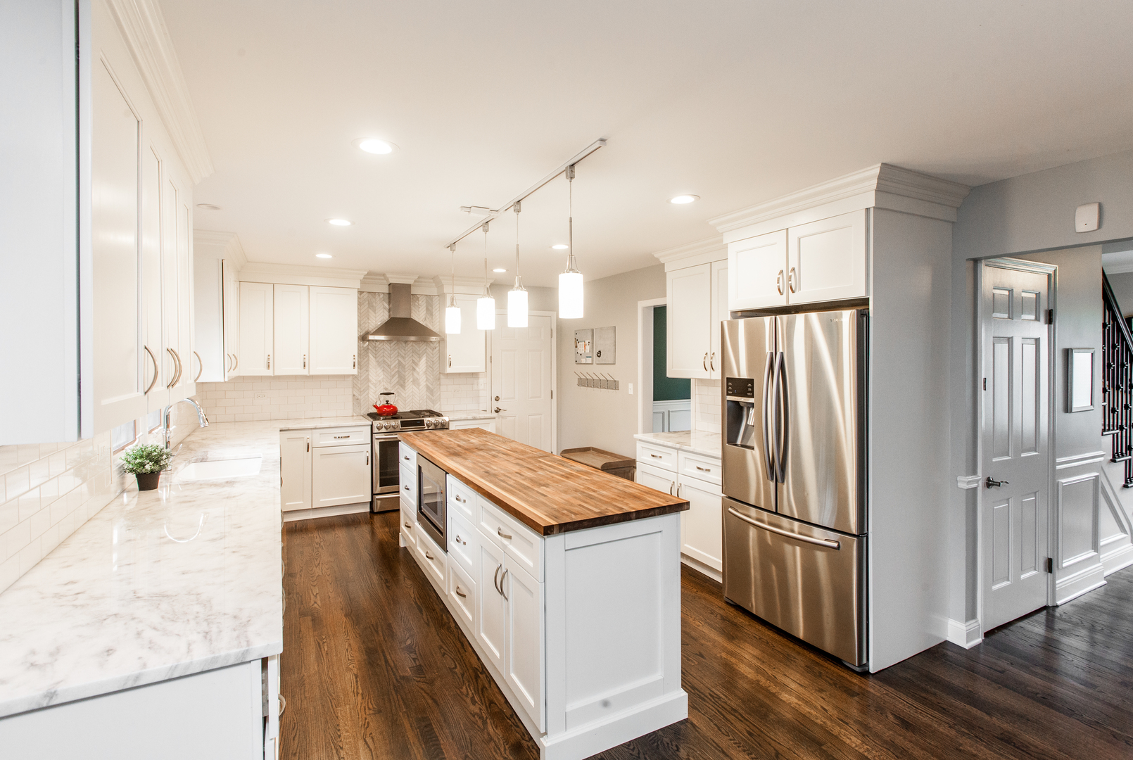 1 Juniper Road Rolling Meadows, IL 60008 - Photo 10 of 29 a kitchen with stainless steel appliances granite countertop a refrigerator a sink and a stove