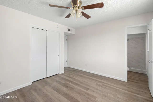 a bathroom with a sink a mirror and a shower