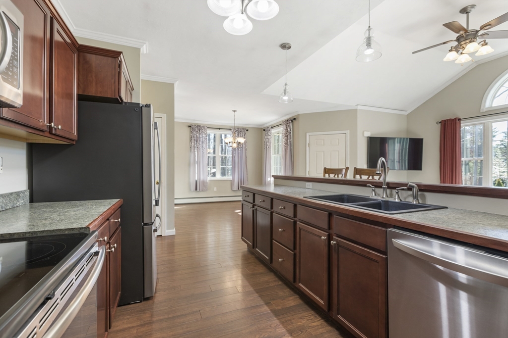 204 Brookfield Road Charlton, MA 01507 - Photo 15 of 36 a kitchen with stainless steel appliances granite countertop a sink stove and refrigerator