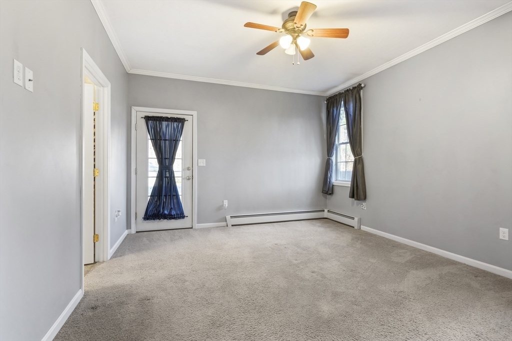 204 Brookfield Road Charlton, MA 01507 - Photo 17 of 36 an empty room with windows and fan