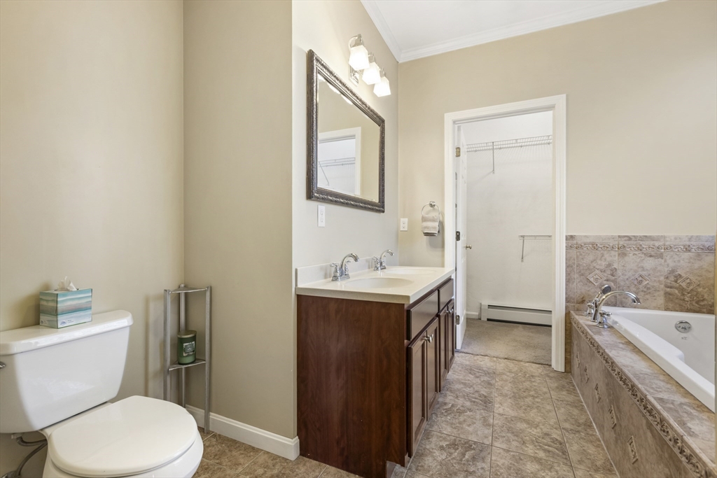 204 Brookfield Road Charlton, MA 01507 - Photo 20 of 36 a bathroom with a sink a toilet and shower