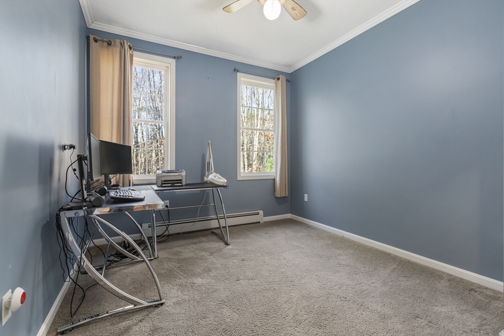 204 Brookfield Road Charlton, MA 01507 - Photo 23 of 36 a view of a workspace with furniture and a window