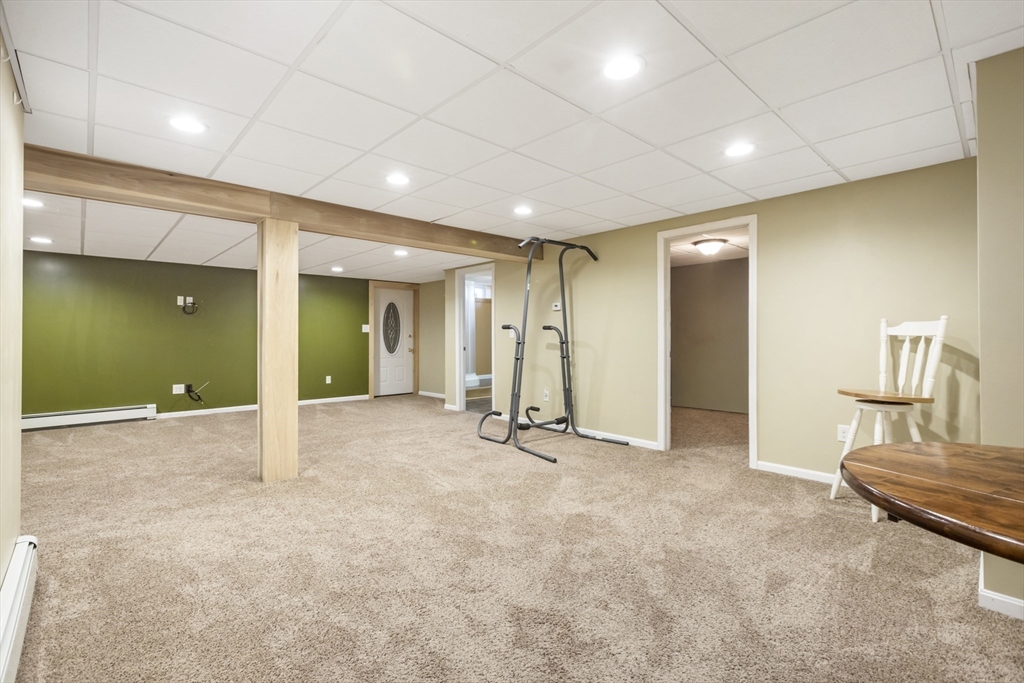 204 Brookfield Road Charlton, MA 01507 - Photo 34 of 36 a view of a livingroom with a staircase