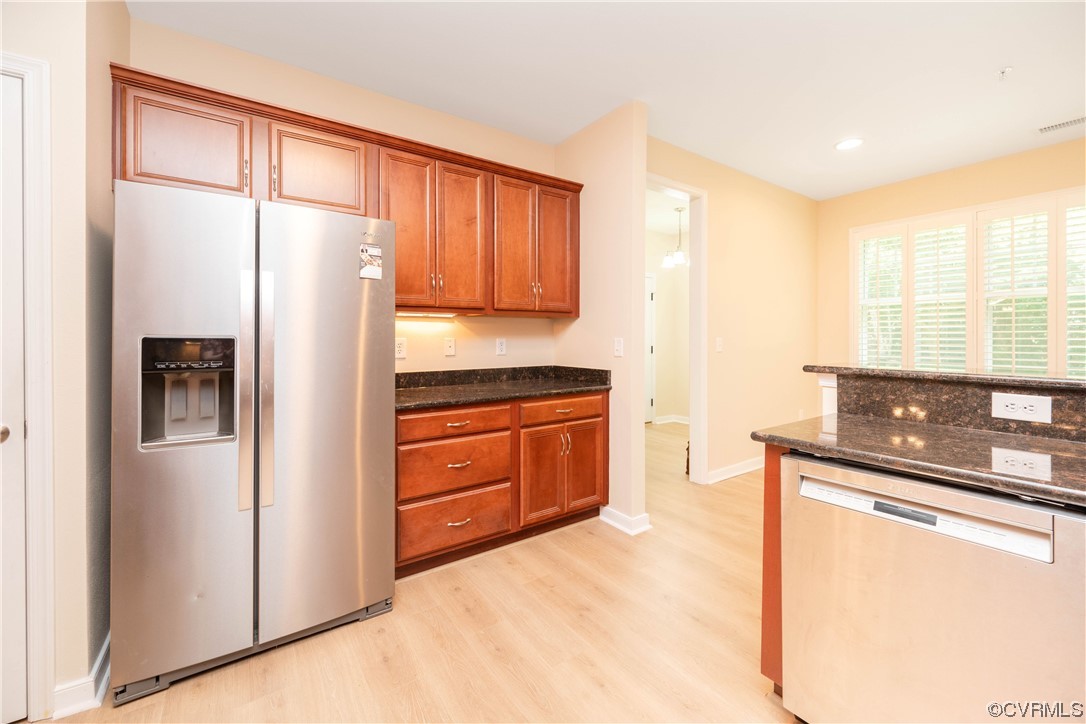 3421 Coles Point Way, Unit E Glen Allen, VA 23060 - Photo 12 of 28 a kitchen with granite countertop a refrigerator stove and sink