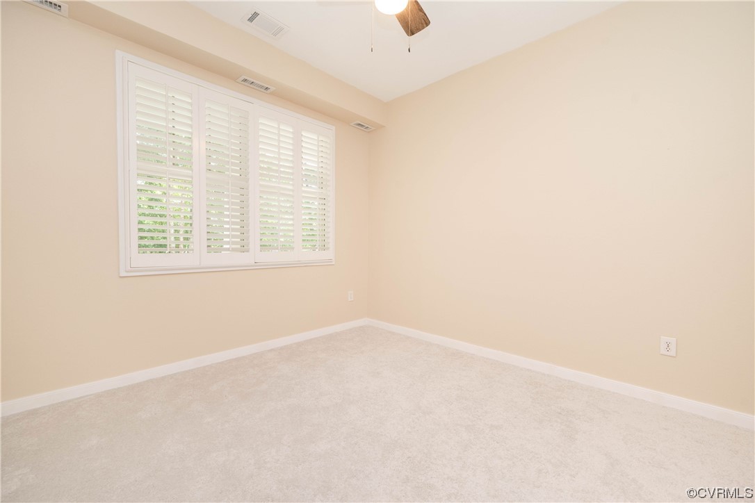 3421 Coles Point Way, Unit E Glen Allen, VA 23060 - Photo 22 of 28 an empty room with a window