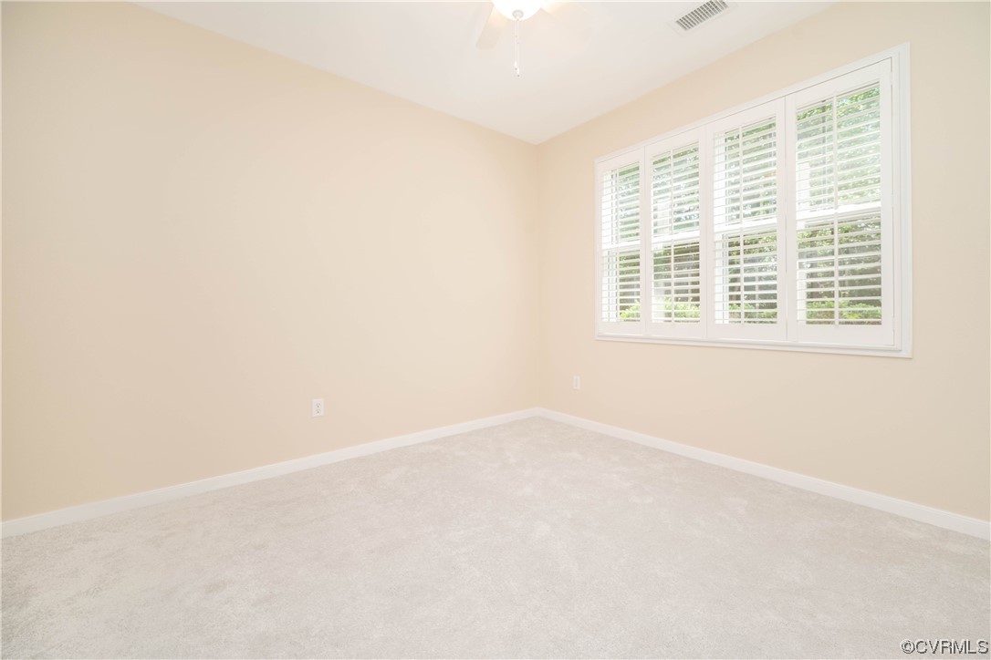 3421 Coles Point Way, Unit E Glen Allen, VA 23060 - Photo 26 of 28 an empty room with a window