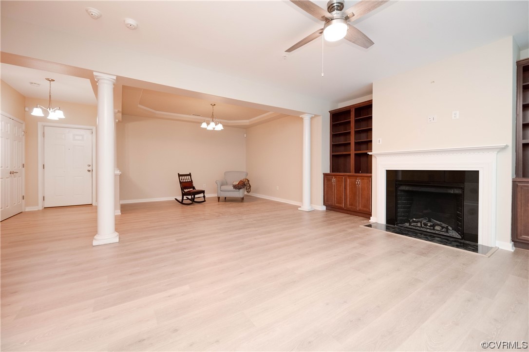 3421 Coles Point Way, Unit E Glen Allen, VA 23060 - Photo 9 of 28 a view of a livingroom with a fireplace and a ceiling fan