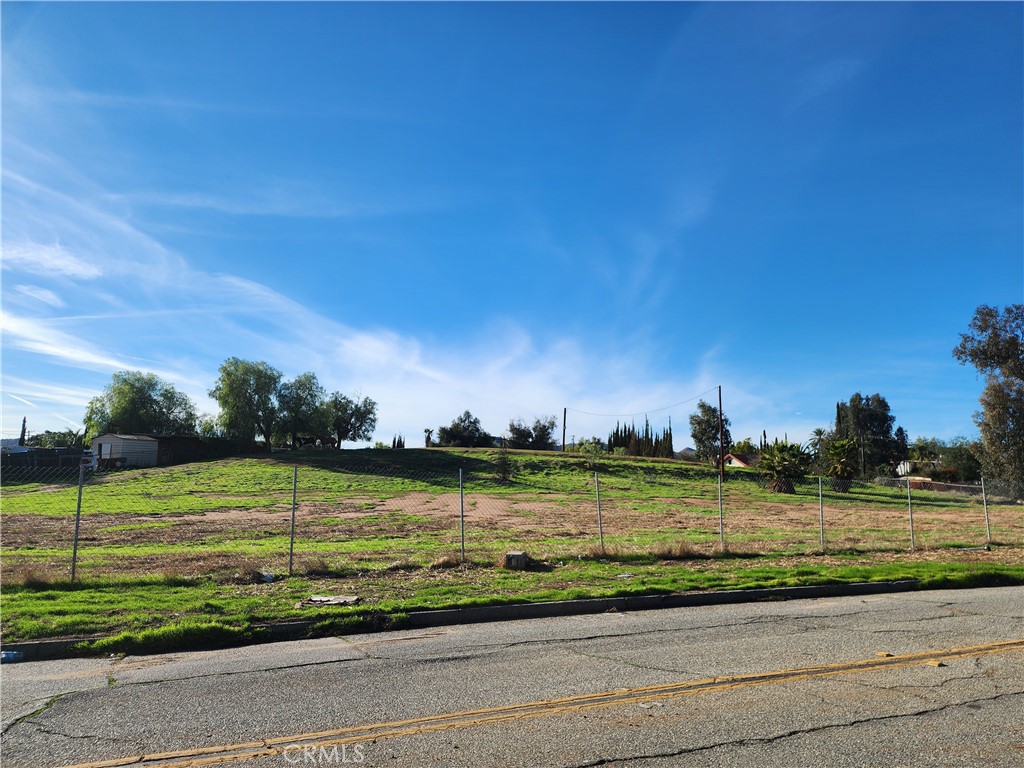 4998 Bushnell Avenue Riverside, CA 92505 - Photo 1 of 2 a view of a golf course with a lake view