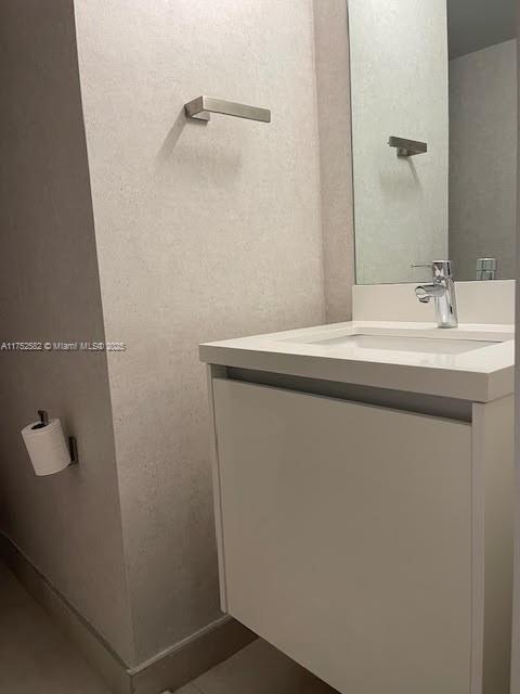 Doral Doral, FL 33178 - Photo 11 of 38 a bathroom with a sink and mirror