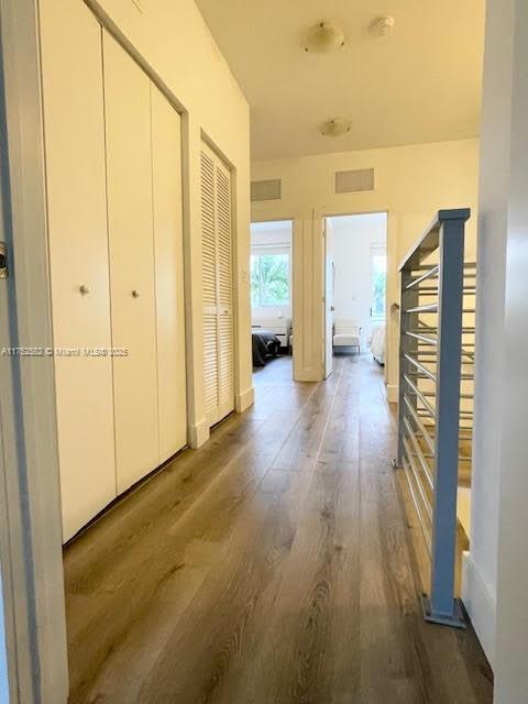 Doral Doral, FL 33178 - Photo 18 of 38 a view of a hallway with wooden floor