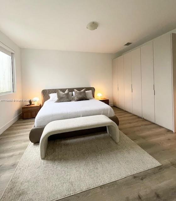 Doral Doral, FL 33178 - Photo 19 of 38 a bedroom with a bed and a cabinets