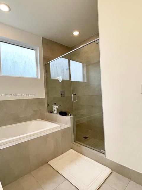 Doral Doral, FL 33178 - Photo 25 of 38 a bathroom with a bathtub and shower