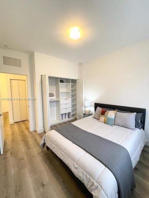 Doral Doral, FL 33178 - Photo 27 of 38 a spacious bedroom with a bed and a window