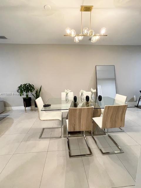 Doral Doral, FL 33178 - Photo 3 of 38 a living room with furniture and a chandelier