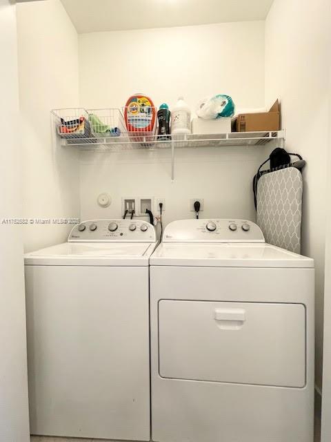 Doral Doral, FL 33178 - Photo 33 of 38 a utility room with dryer and washer