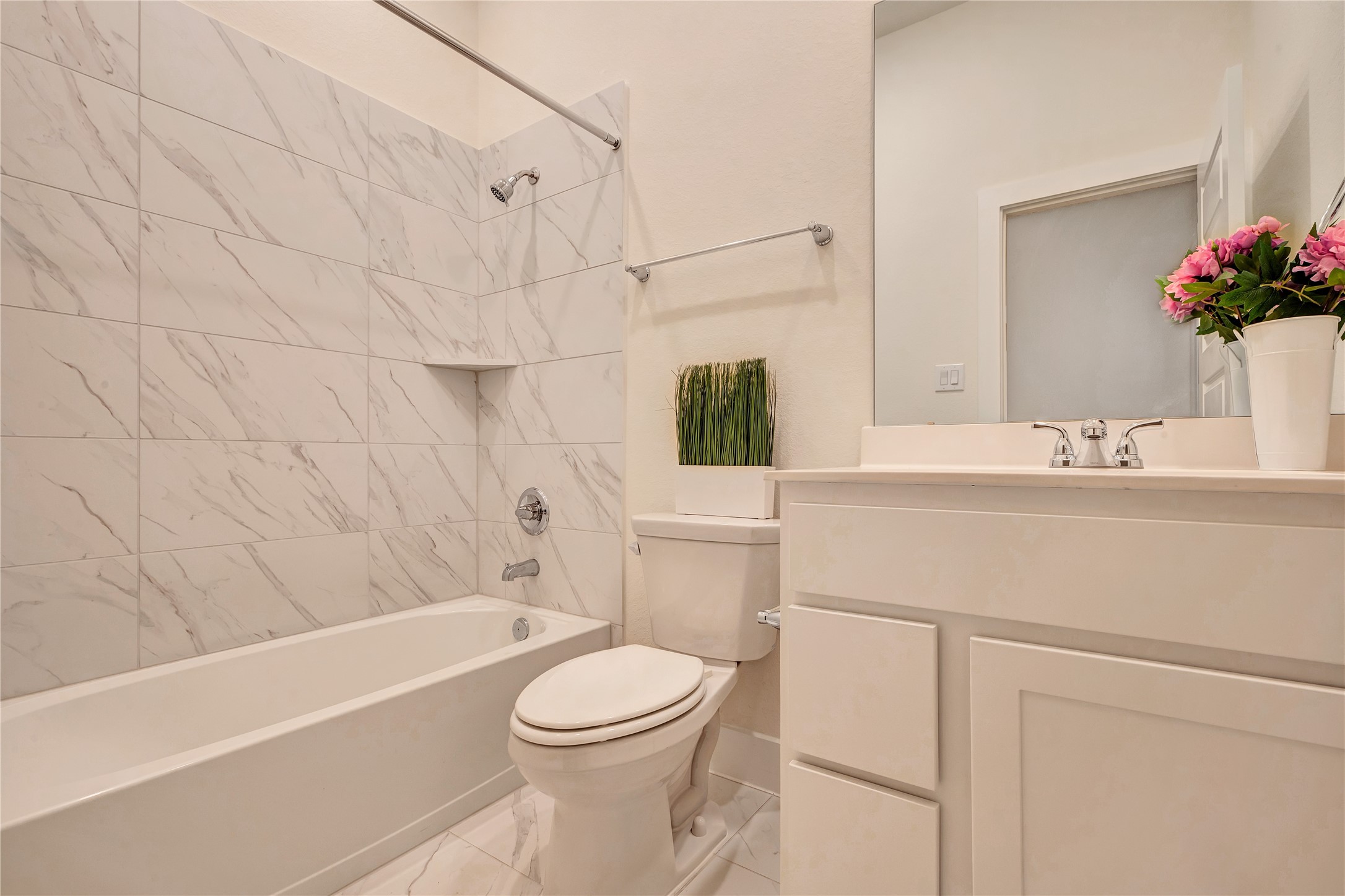 6027 Churchill Spgs Lane Fulshear, TX 77441 - Photo 21 of 25 a bathroom with a sink a toilet and shower