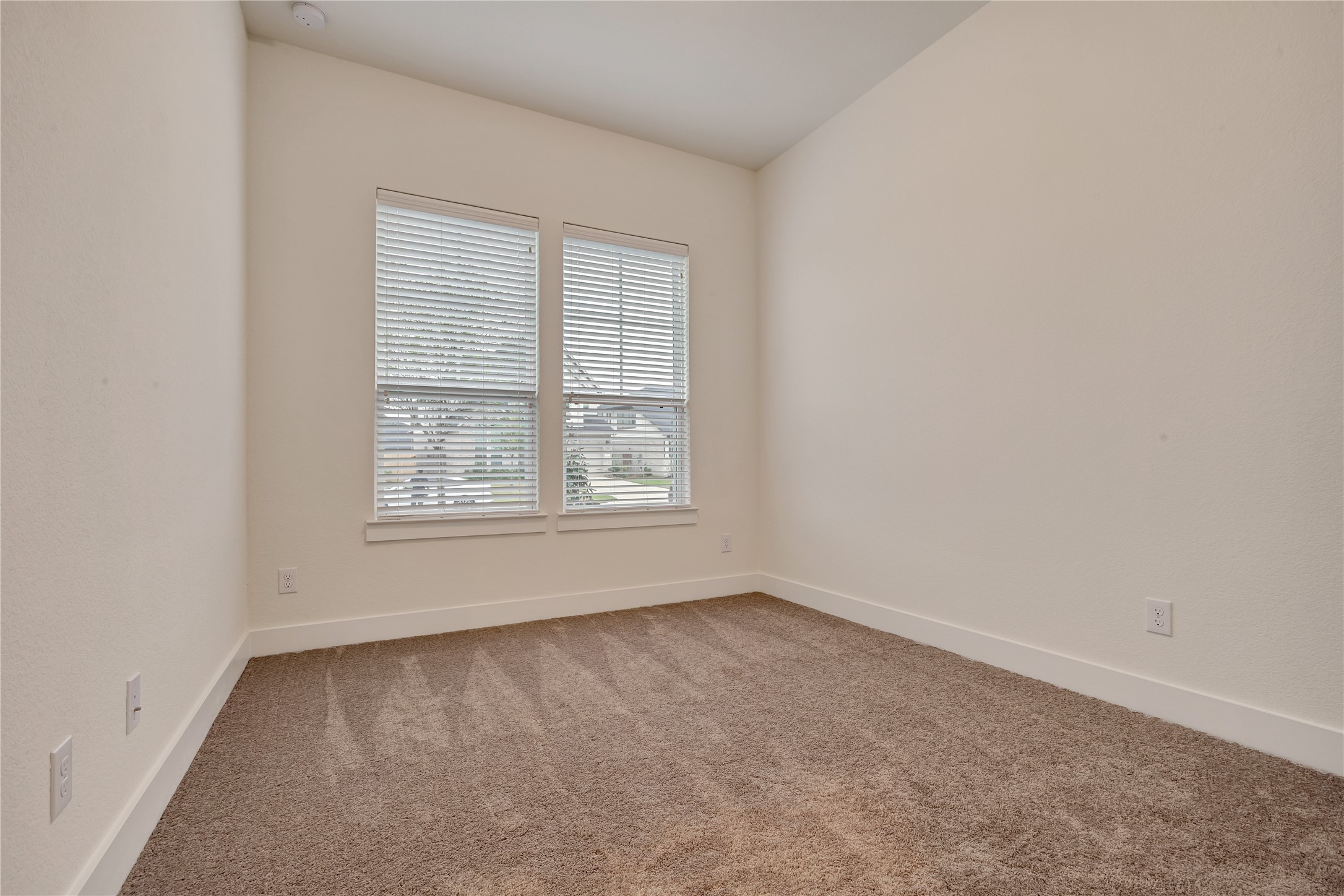 6027 Churchill Spgs Lane Fulshear, TX 77441 - Photo 23 of 25 an empty room with a window