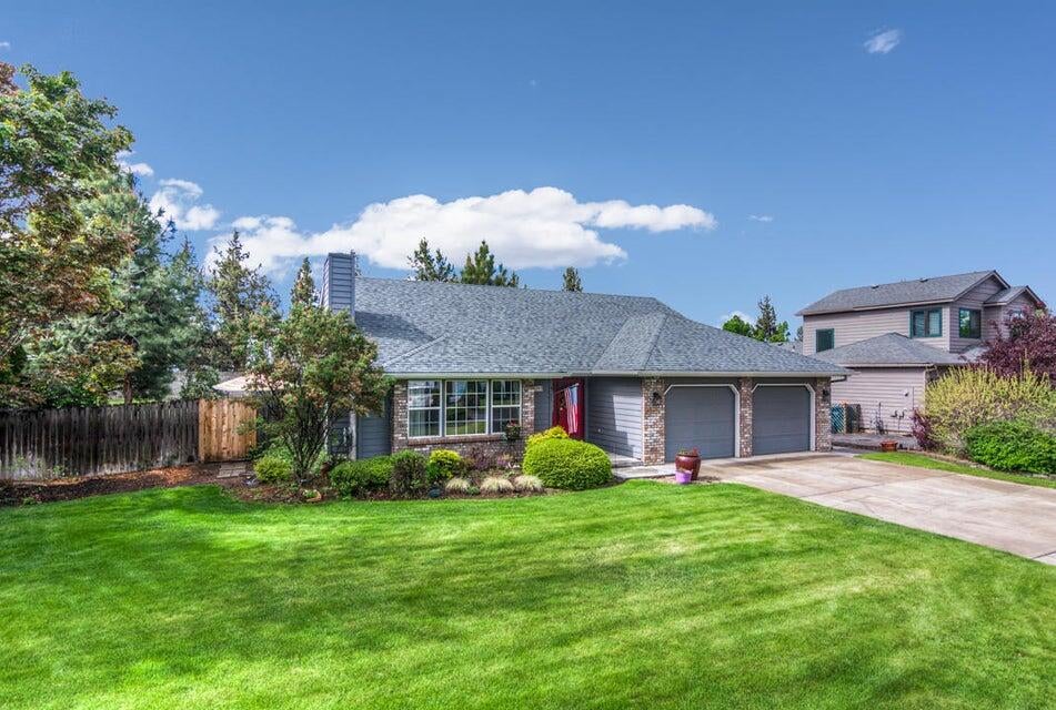 3393 Northeast Stonebrook Loop Bend, OR 97701 - Photo 2 of 23 Large lawn in front of home and also in the rear cared for by the HOA