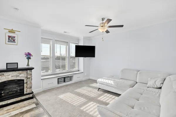 a bedroom with a bed furniture and a flat screen tv