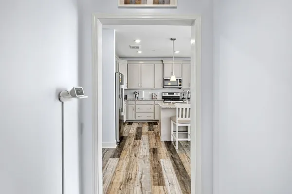 a view of a kitchen with a sink