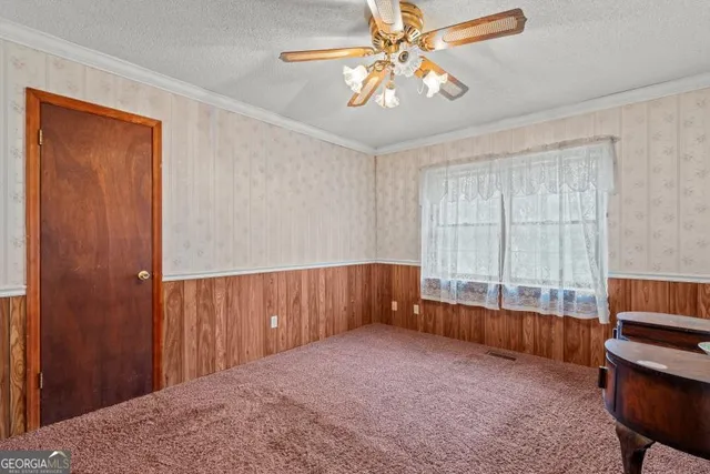 a view of workspace with furniture and window