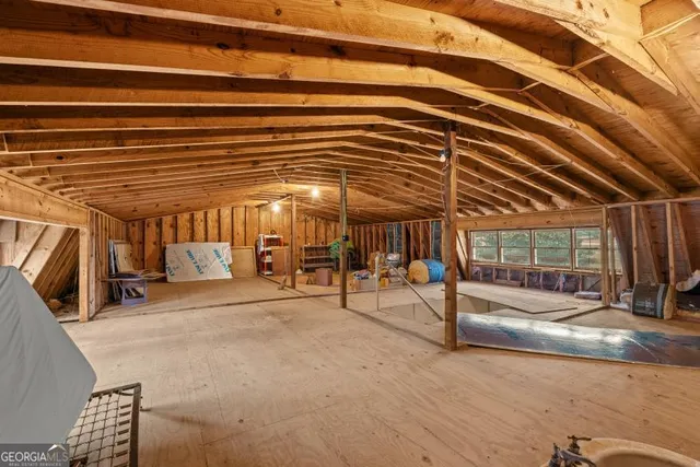 a view of an empty room with stairs