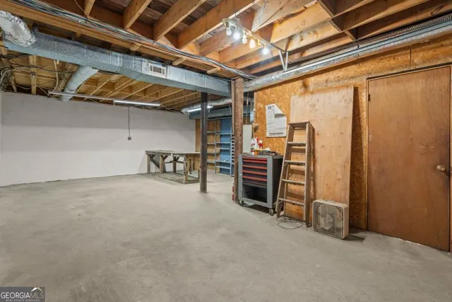 a view of a room with wooden walls