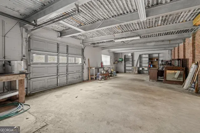 a view of a car park in front of house