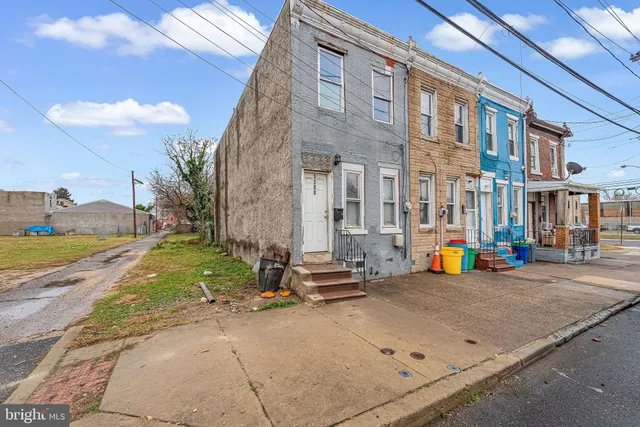 a view of a street with cars