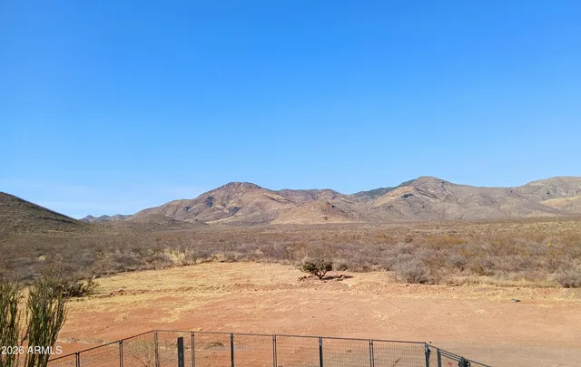 a view of ocean and mountain