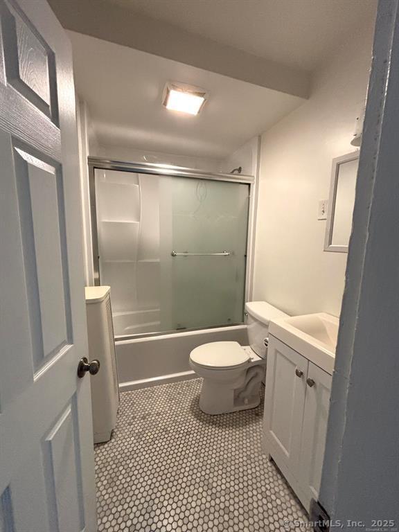 138 Mill Hill Avenue, Unit 1 Bridgeport, CT 06610 - Photo 7 of 8 a bathroom with a toilet and a shower