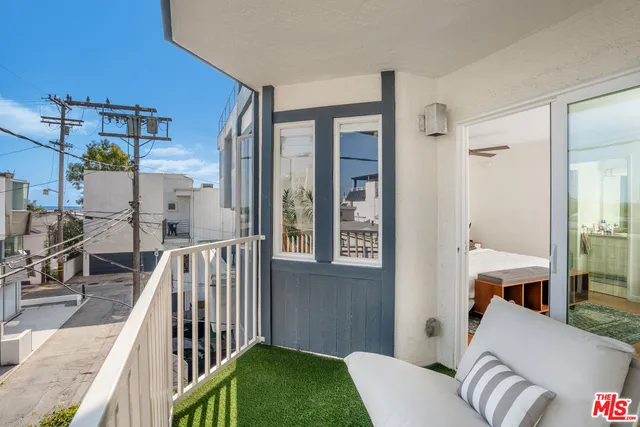 a view of a bedroom and workspace
