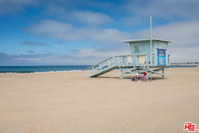 a picture of a room with a ceiling fan