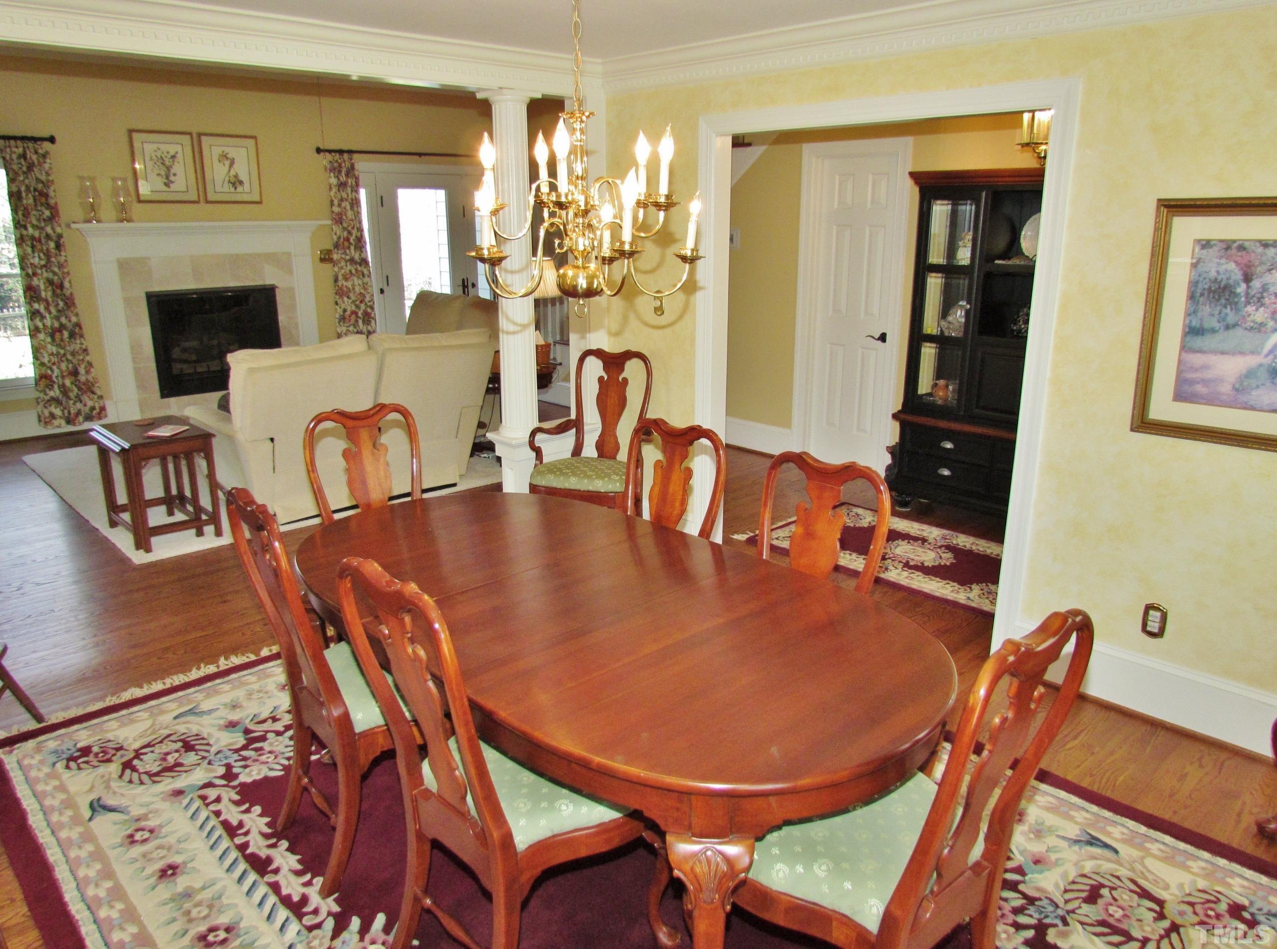12001 Pembridge Lane Raleigh, NC 27613 - Photo 15 of 53 a dining room with furniture and window