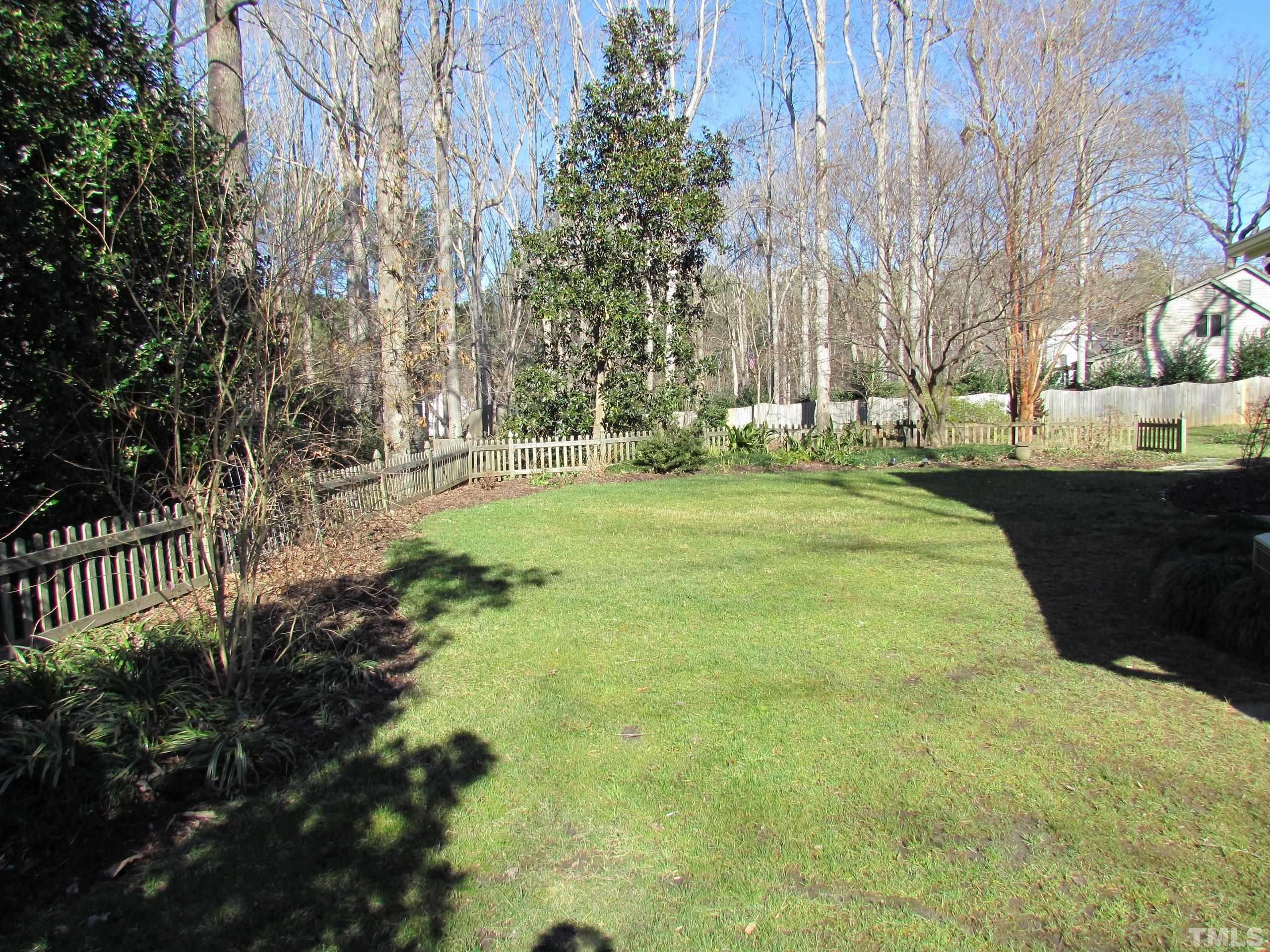 12001 Pembridge Lane Raleigh, NC 27613 - Photo 44 of 53 a view of a park with large trees