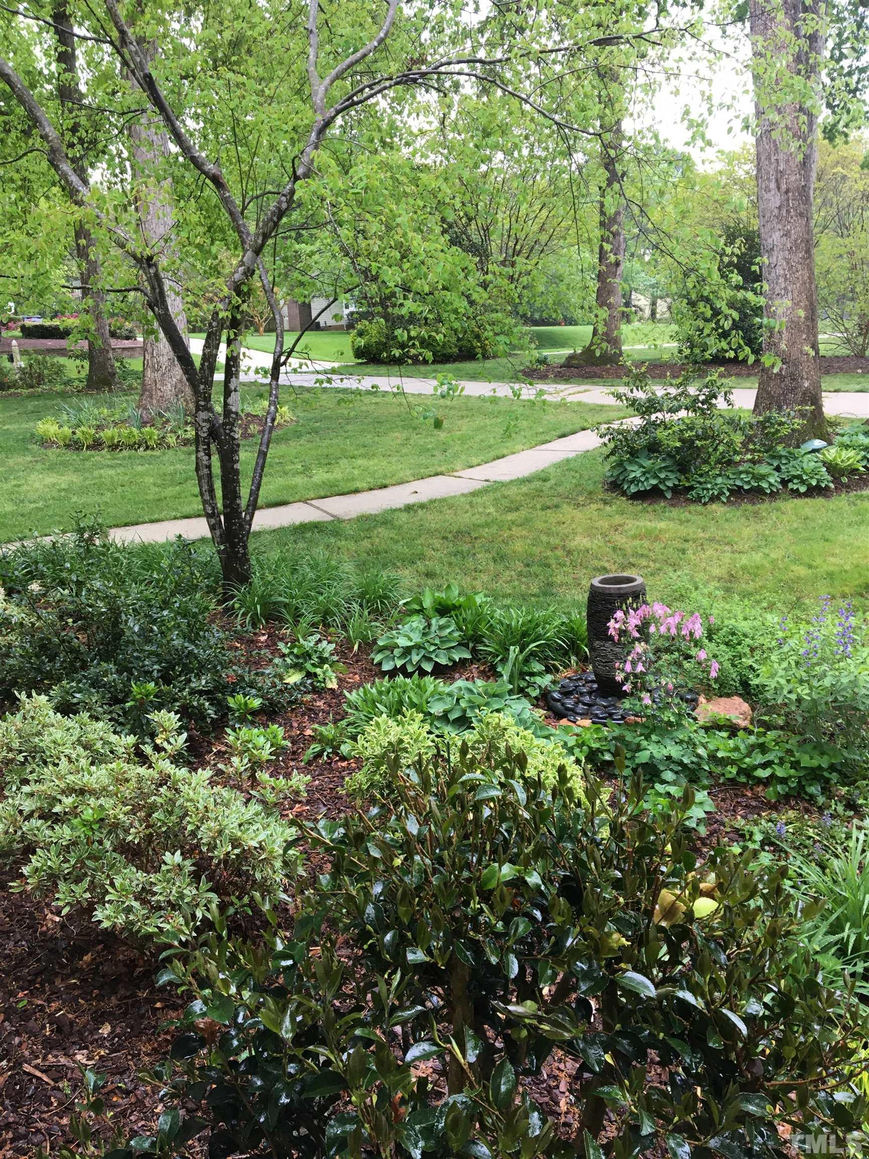 12001 Pembridge Lane Raleigh, NC 27613 - Photo 49 of 53 a view of a lush green space