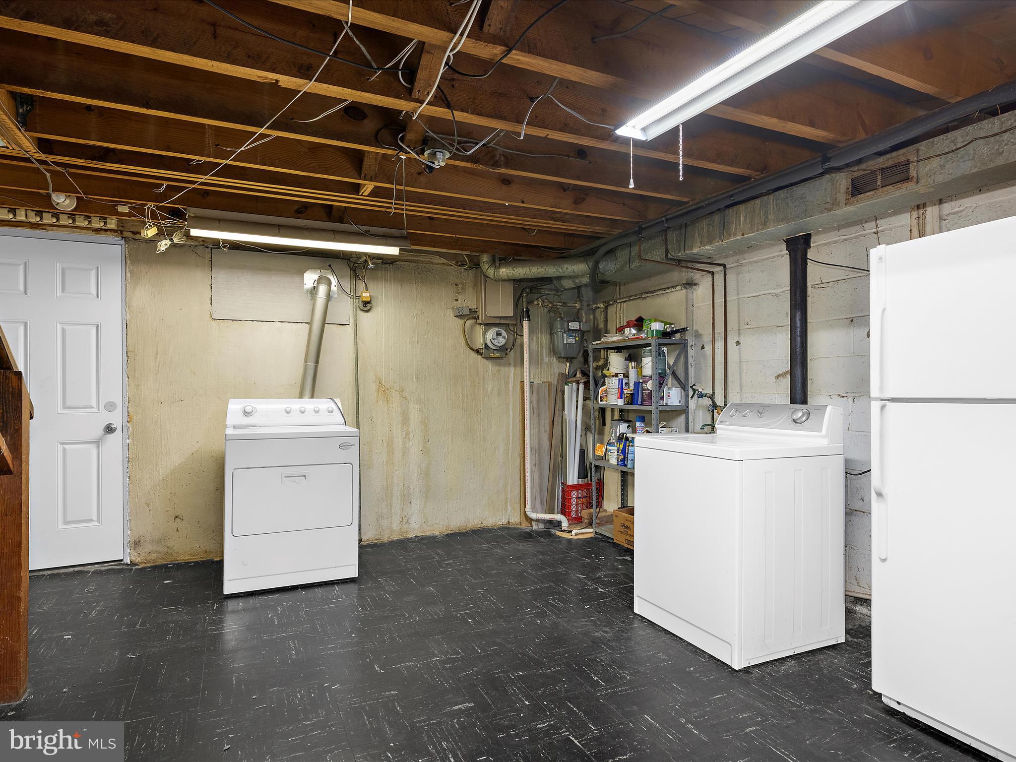 8104 Mid Haven Road Baltimore, MD 21222 - Photo 25 of 35 LAUNDRY & STORAGE AREA.