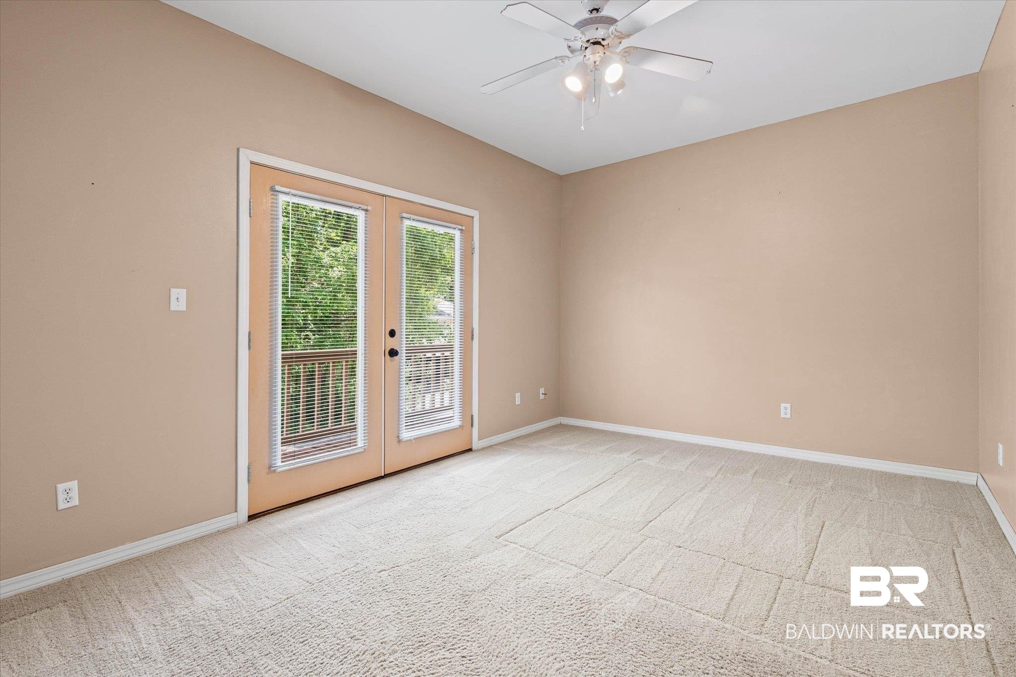 41923 Bayou Road Bay Minette, AL 36507 - Photo 17 of 35 Room featuring neutral-toned walls and light-colored carpet flooring