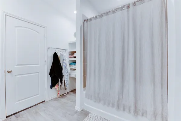 a bathroom with a sink and mirror