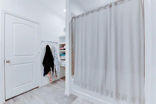 a bathroom with a sink and mirror