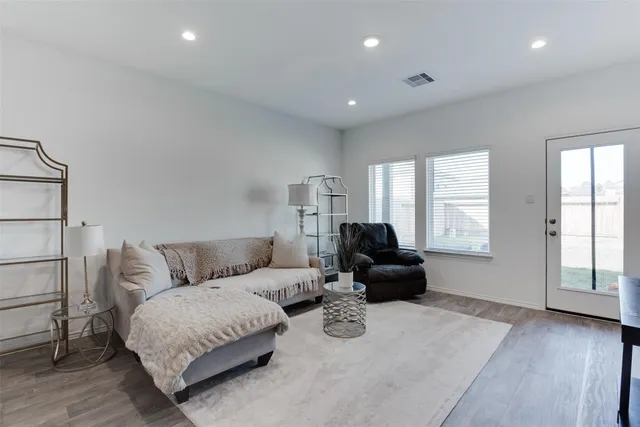 a living room with furniture and a couch