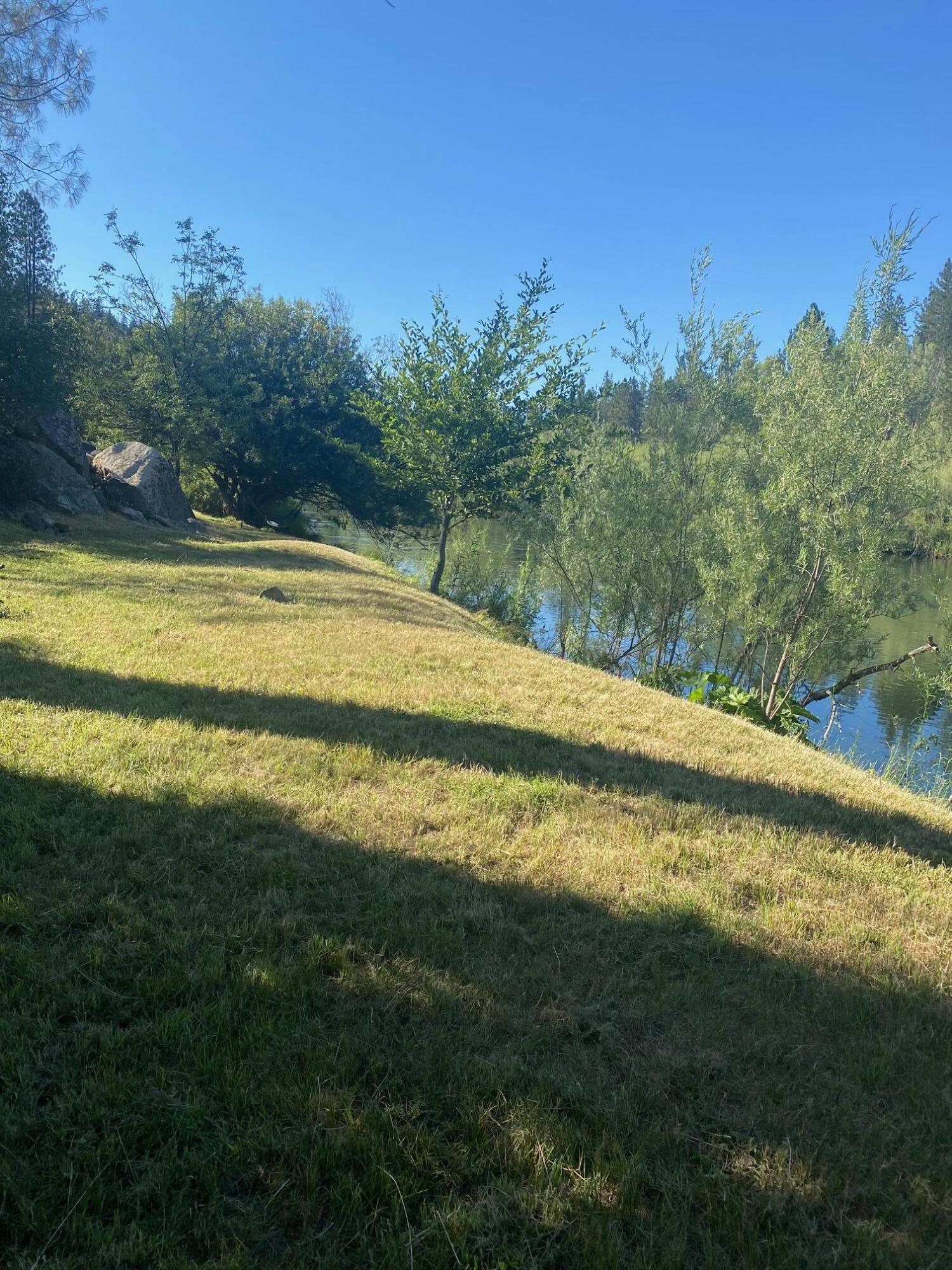 61 Chief George Lewiston, CA 96052 - Photo 16 of 101 a view of a swimming pool with an outdoor space and seating area