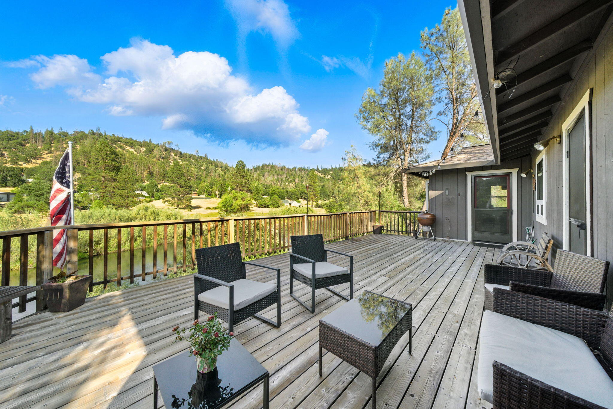 61 Chief George Lewiston, CA 96052 - Photo 17 of 101 a view of a balcony with wooden floor and outdoor seating