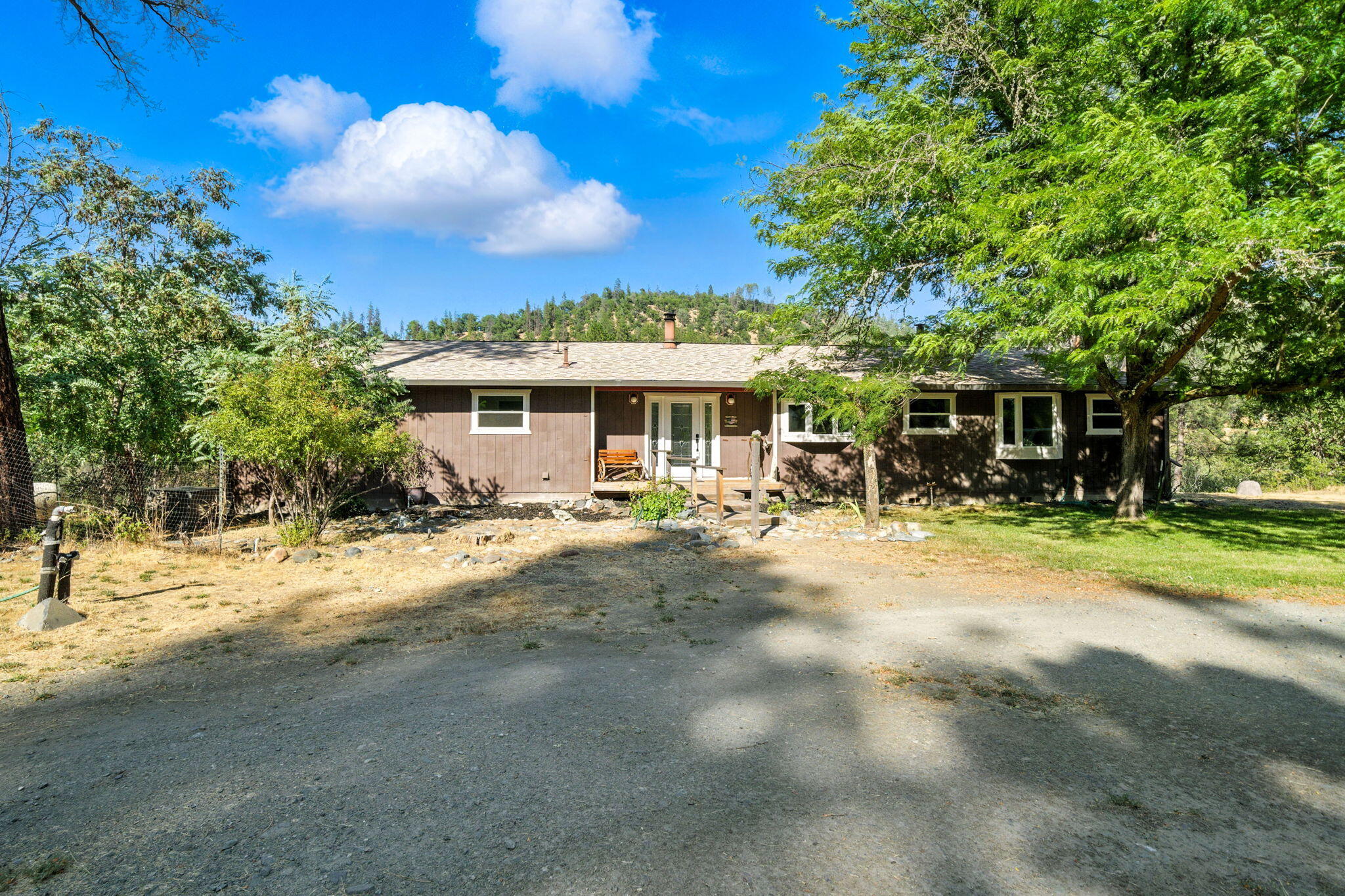 61 Chief George Lewiston, CA 96052 - Photo 18 of 101 a front view of a house with a yard